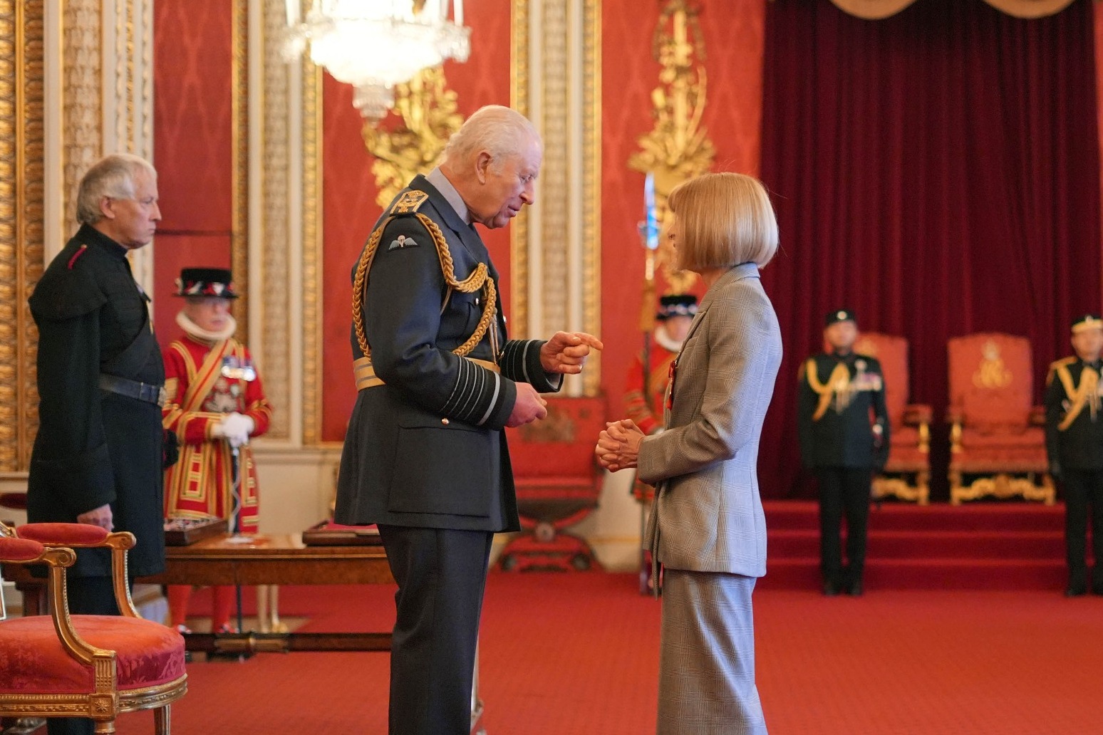 Anna Wintour says she will not stop working as she is honoured at palace 